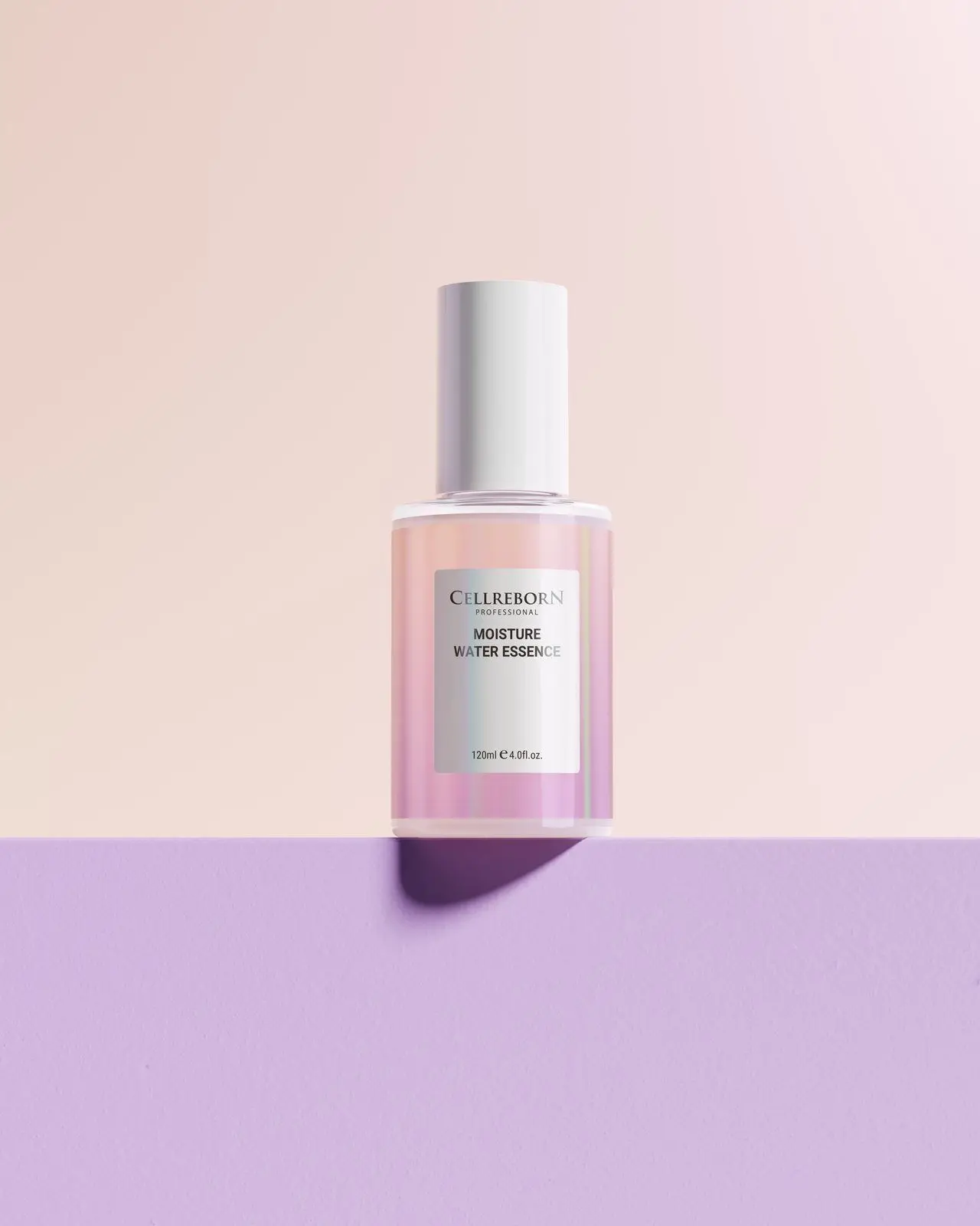 CELLREBORN Athens Moisture Water Essence bottle on a lilac ledge against a soft pink backdrop