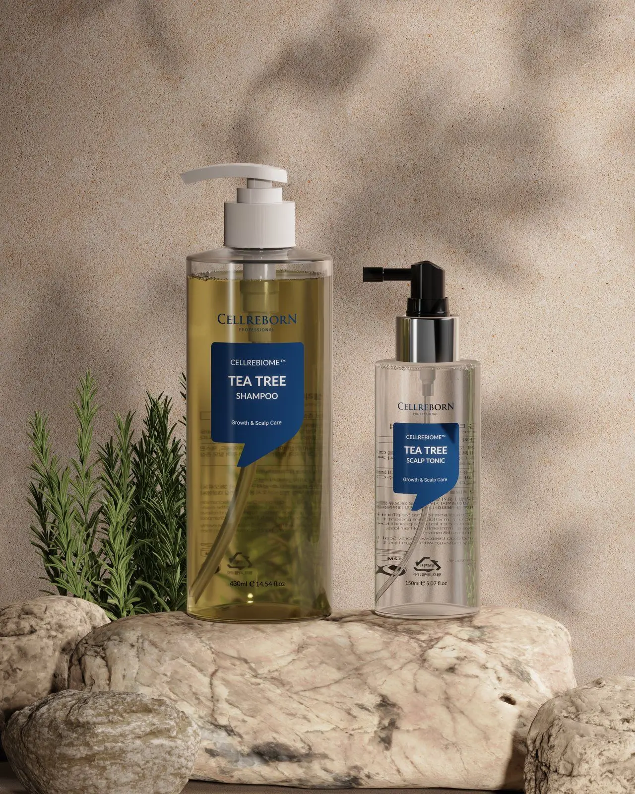 Cellrebiome Tea Tree Shampoo and Tea Tree Scalp Tonic on beige stones with rosemary sprigs and leaf shadows