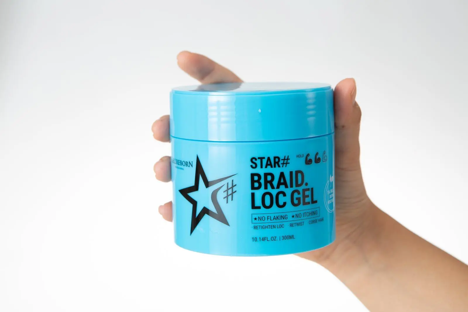 A hand holding a blue CELLREBORN STAR# Braid Loc Gel jar against a white backdrop